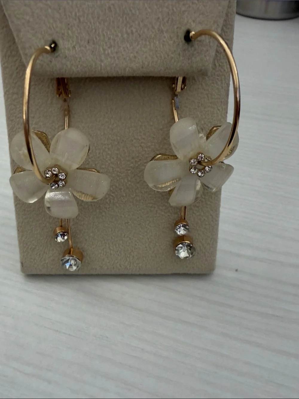 Gold Hoop Earrings with White Flower Drops and Crystal Accents